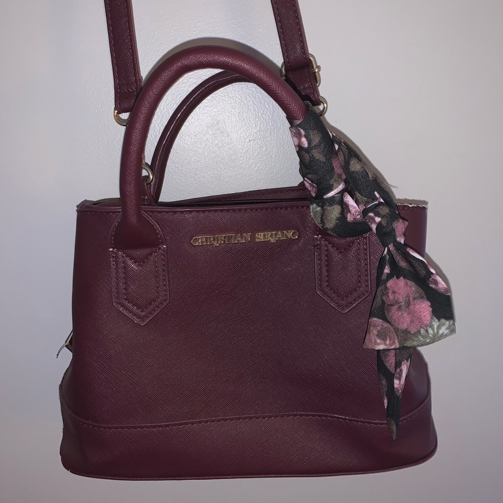 Christian Siriano gently used plum colored purse w/long strap